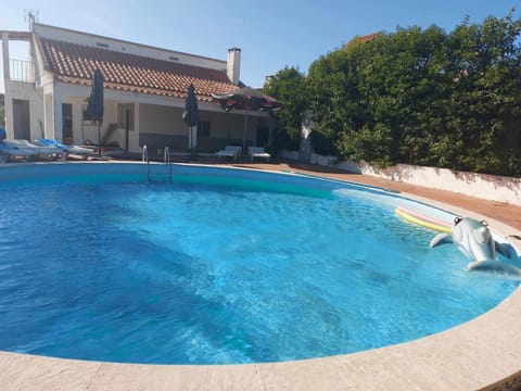 Property building, Swimming pool, sunbed