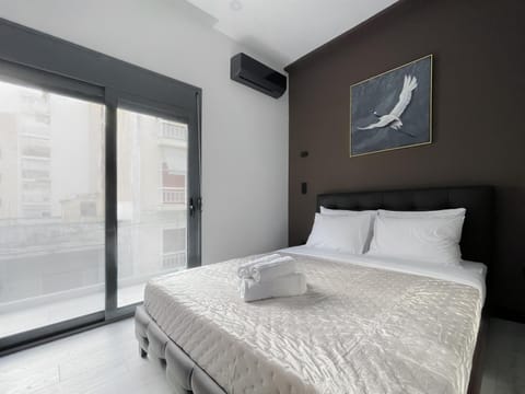 Bed, Photo of the whole room, Bedroom, towels, air conditioner