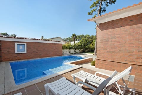 Property building, Living room, Swimming pool