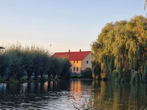 Property building, Day, Natural landscape, Lake view