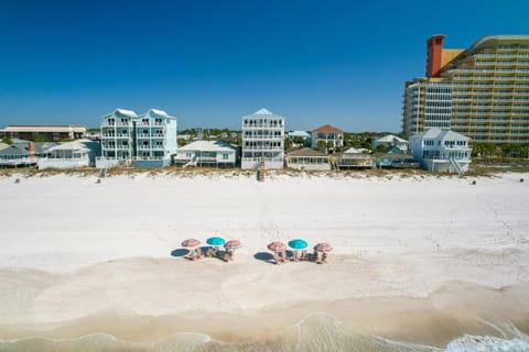 Property building, People, Natural landscape, Beach, Sea view, group of guests, sunbed