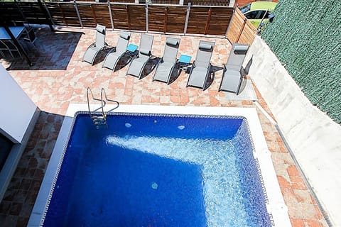 Patio, Pool view, Swimming pool, sunbed