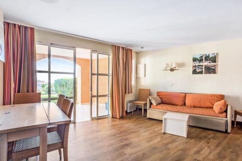 Bed, Living room, fireplace, kitchen