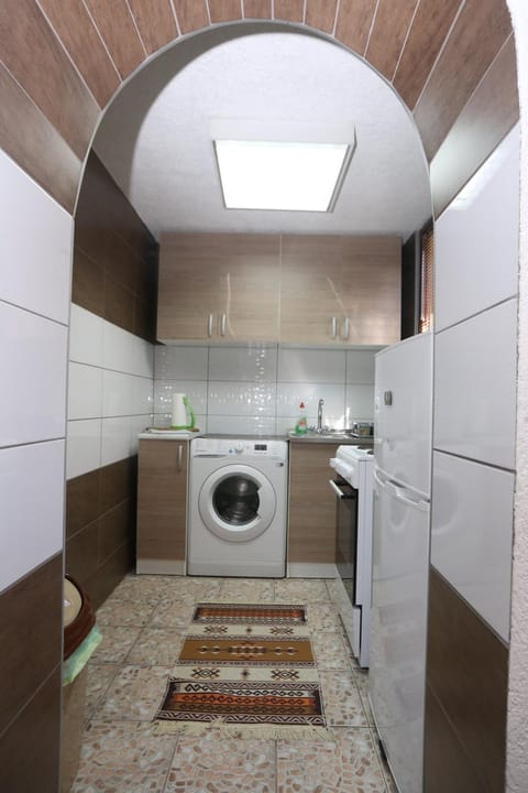Kitchen or kitchenette, washing machine