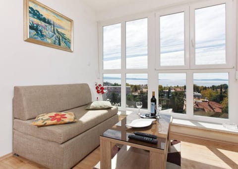 View (from property/room), Living room, Seating area, Sea view