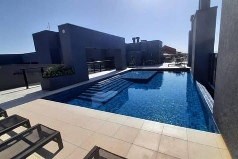 Swimming pool, sunbed