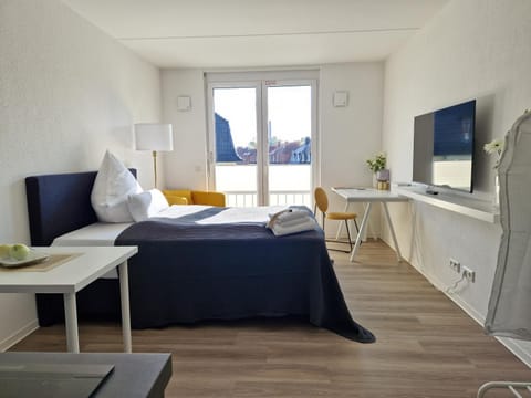 Bed, TV and multimedia, Living room, Bedroom