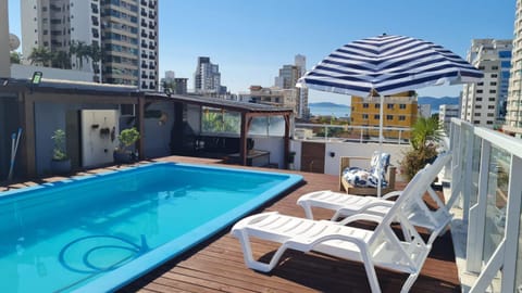 Property building, BBQ facilities, View (from property/room), Balcony/Terrace, Swimming pool, Public Bath, sunbed