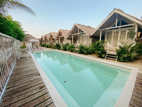 Property building, Day, Pool view, Swimming pool, sunbed