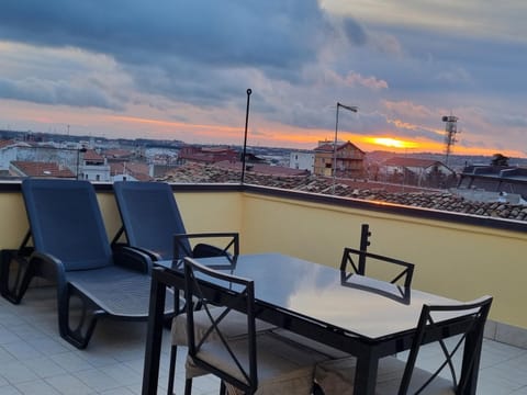 View (from property/room), Balcony/Terrace, Dining area, Sunset