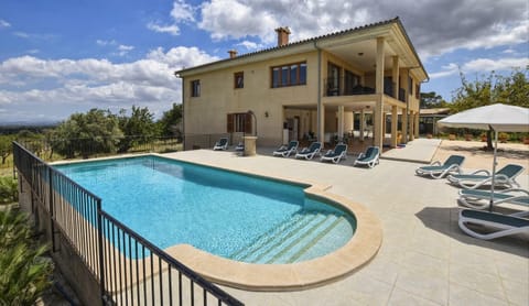 Property building, Living room, Swimming pool
