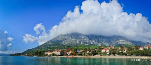 Facade/entrance, View (from property/room), Beach, City view
