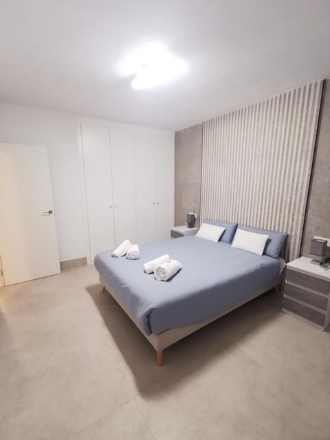 Bed, Photo of the whole room, Bedroom, towels, wardrobe