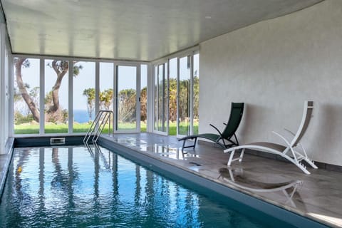 Property building, Living room, Swimming pool