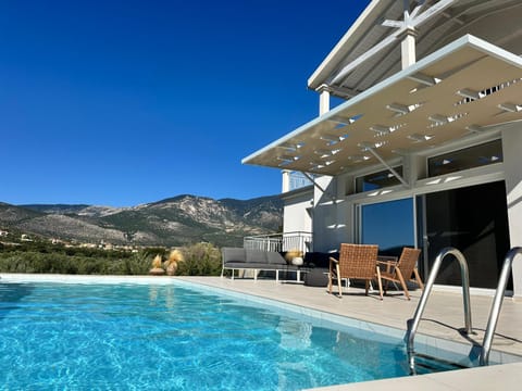 Property building, Patio, Natural landscape, Mountain view, Pool view, Swimming pool, sunbed