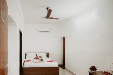 Bed, Bedroom, fireplace, towels, air conditioner