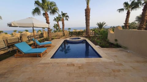 Patio, Day, Natural landscape, Pool view, Sea view, Swimming pool, sunbed