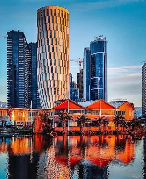 Property building, Nearby landmark, Day, Natural landscape, City view, Lake view