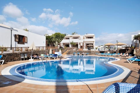 Property building, Living room, Swimming pool