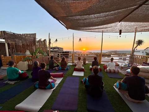 Patio, People, Natural landscape, Activities, View (from property/room), Balcony/Terrace, Sea view, Sunset, group of guests