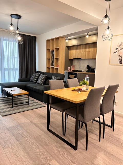 Kitchen or kitchenette, Living room, Seating area, Dining area