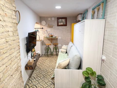 Bed, Living room, Seating area, Bedroom