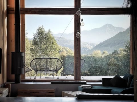 Natural landscape, View (from property/room), Living room, Seating area, Mountain view