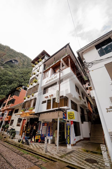 Property building, Natural landscape, Mountain view, Street view