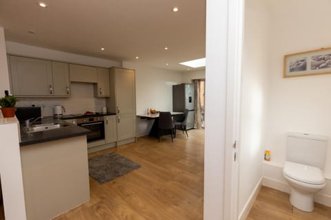 Toilet, Kitchen or kitchenette, Dining area