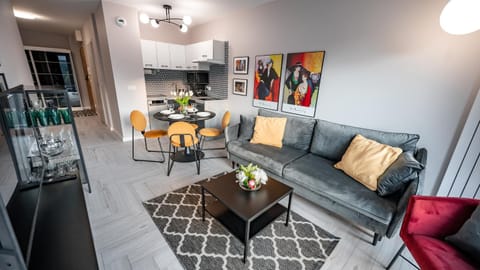 Kitchen or kitchenette, Living room, Seating area, Dining area