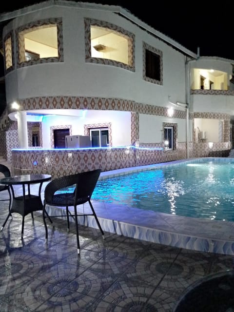 Property building, Night, Pool view, Swimming pool