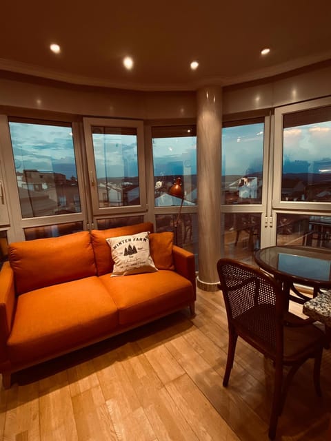 View (from property/room), Living room, Seating area, Dining area