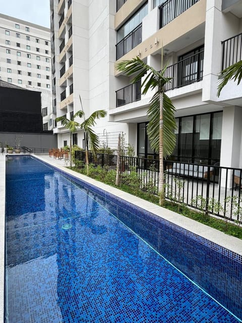 Property building, Pool view, Swimming pool, sunbed