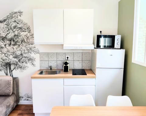 JOLI & MANSARDÉ - Le Jardin de l'Evêché a votre Fenêtre Apartment in Lisieux