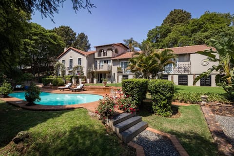 Property building, Natural landscape, Garden, Swimming pool