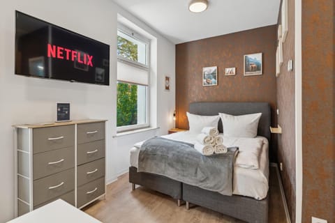 Bed, TV and multimedia, Bedroom, towels, wardrobe