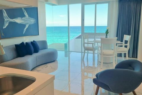 Natural landscape, Living room, Seating area, Dining area, Sea view