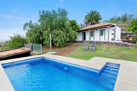 Property building, Living room, Swimming pool