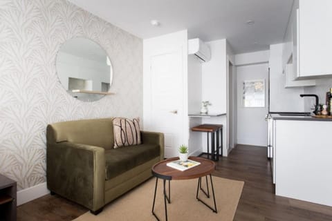 Kitchen or kitchenette, Living room, Seating area, Dining area, air conditioner