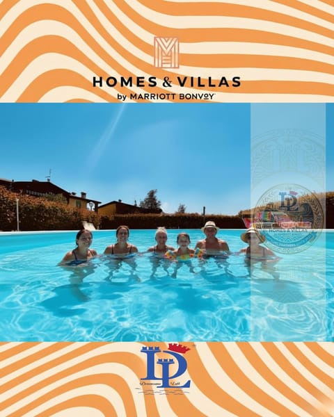 Property building, Logo/Certificate/Sign, Swimming pool, group of guests, Certificate/Award