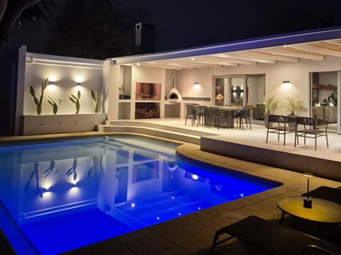 Patio, Night, Pool view, Swimming pool, sunbed