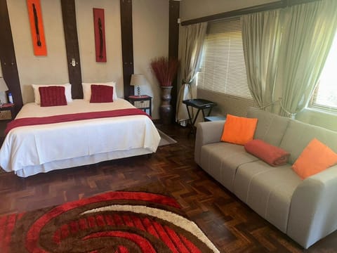 Bed, Seating area, Bedroom
