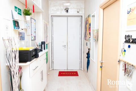 Property building, Facade/entrance, On-site shops, Decorative detail, Text overlay