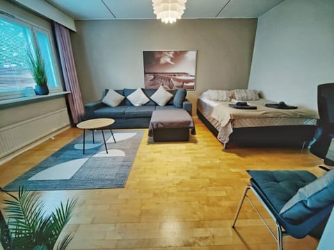Bed, Living room, Seating area, Bedroom