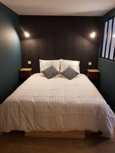 L'atelier, appart avec jardin à 100 m de la mer. Apartment in Granville