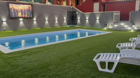 Property building, Living room, Swimming pool