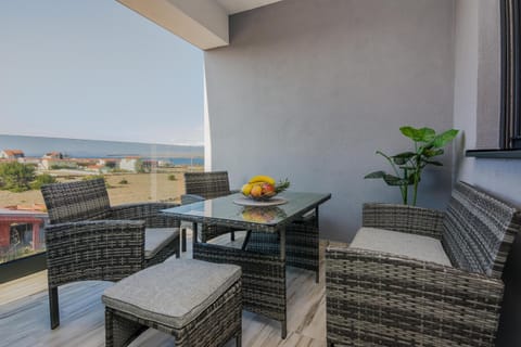 View (from property/room), Balcony/Terrace, Seating area, Sea view