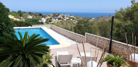 Patio, Natural landscape, Sea view, Swimming pool, sunbed