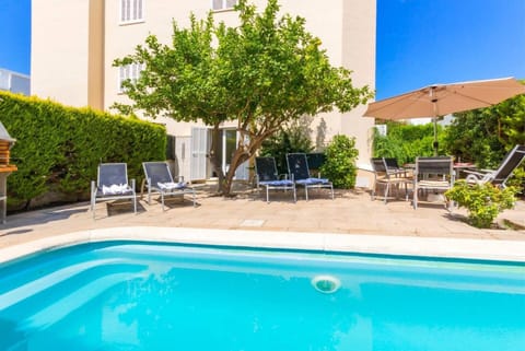 Property building, Living room, Swimming pool