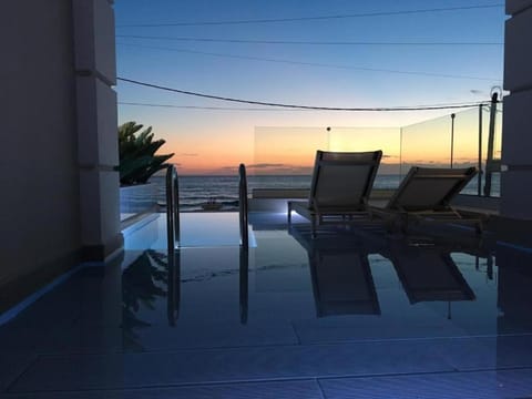 Day, Natural landscape, View (from property/room), Pool view, Sea view, Sunset, sunbed